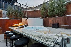 Fenced backyard featuring a patio