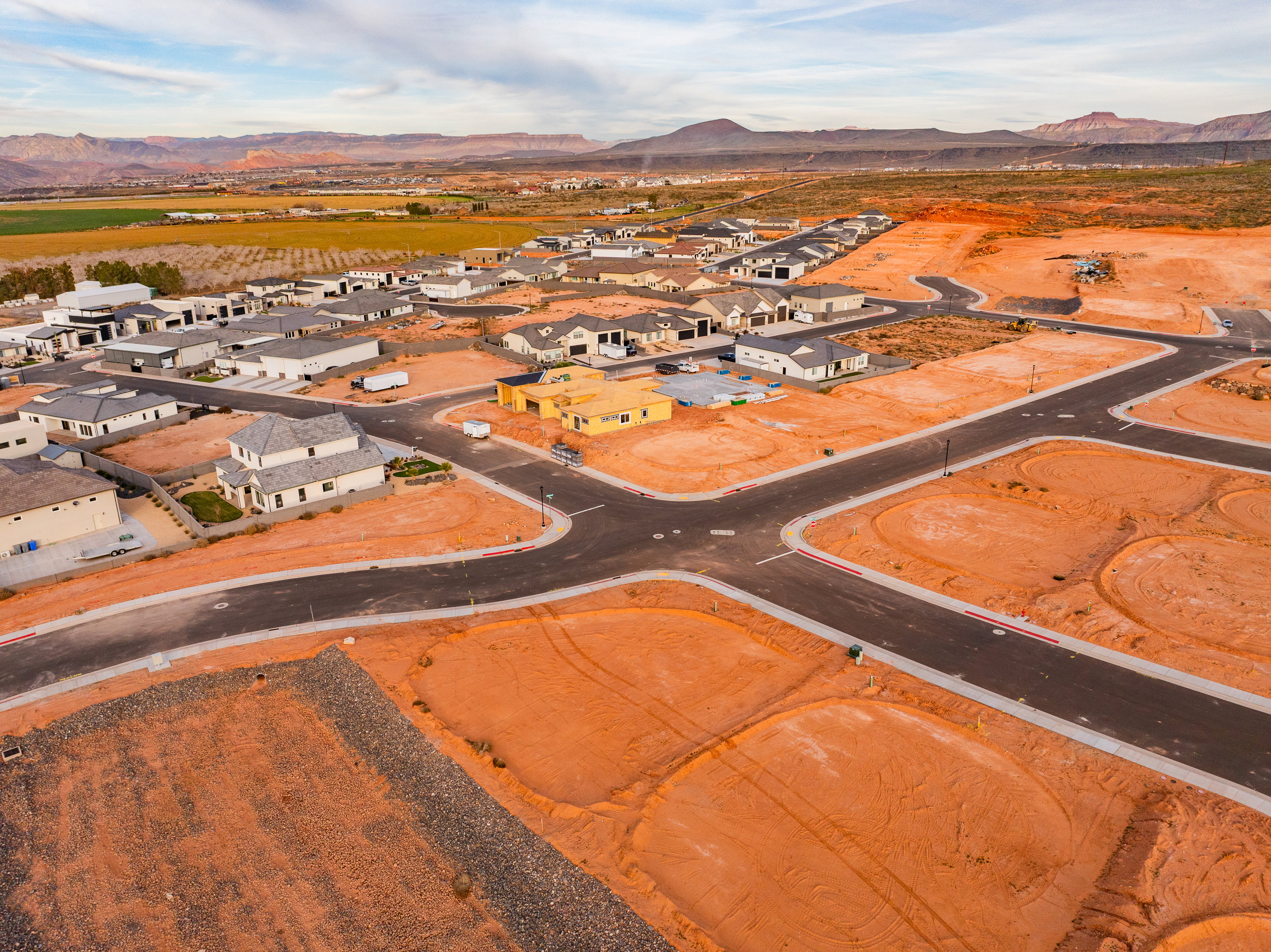 Aerial view of residential area featuring a mountain backdrop