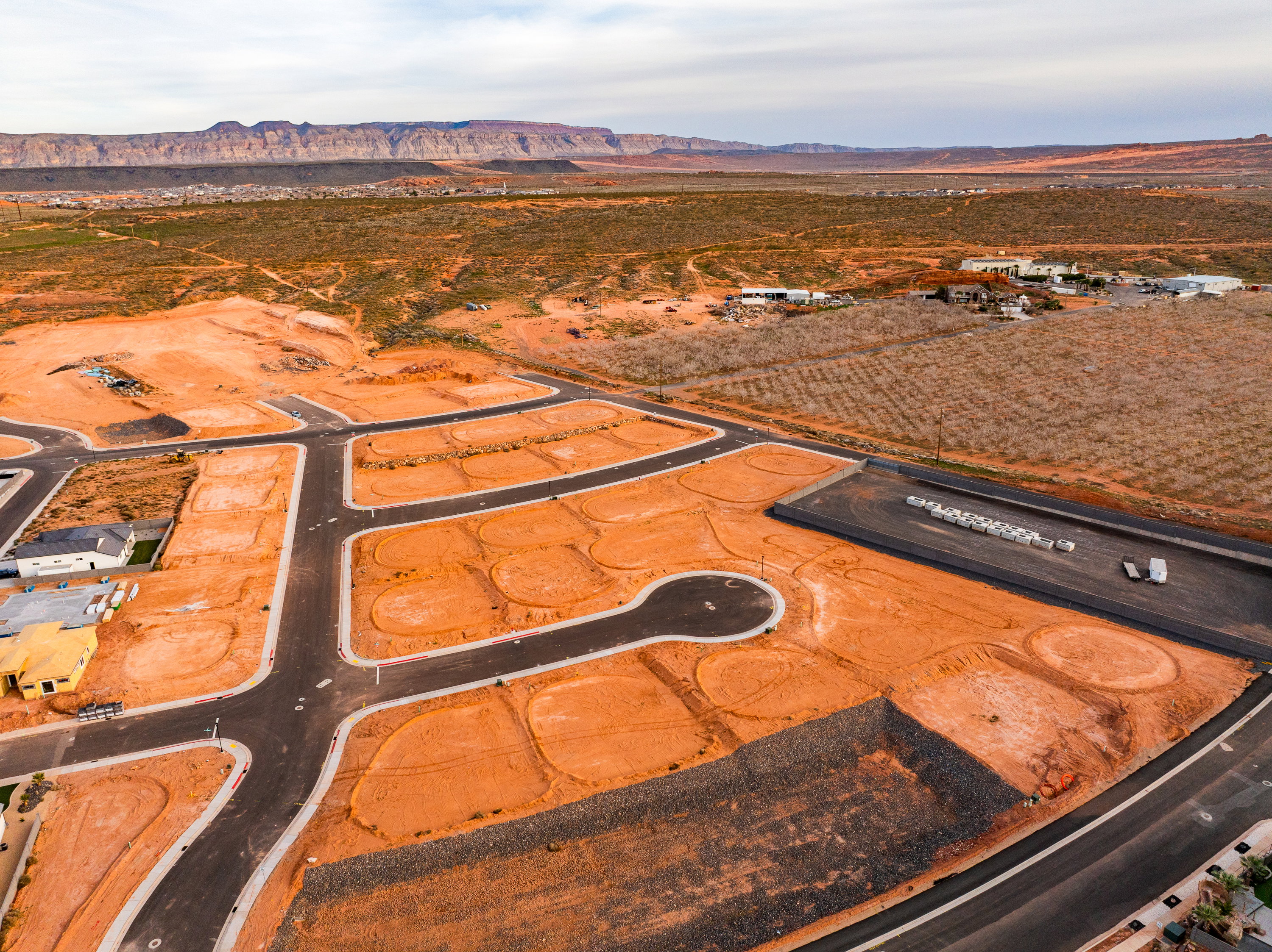 Overview of rural landscape featuring a mountainous background and a desert landscape