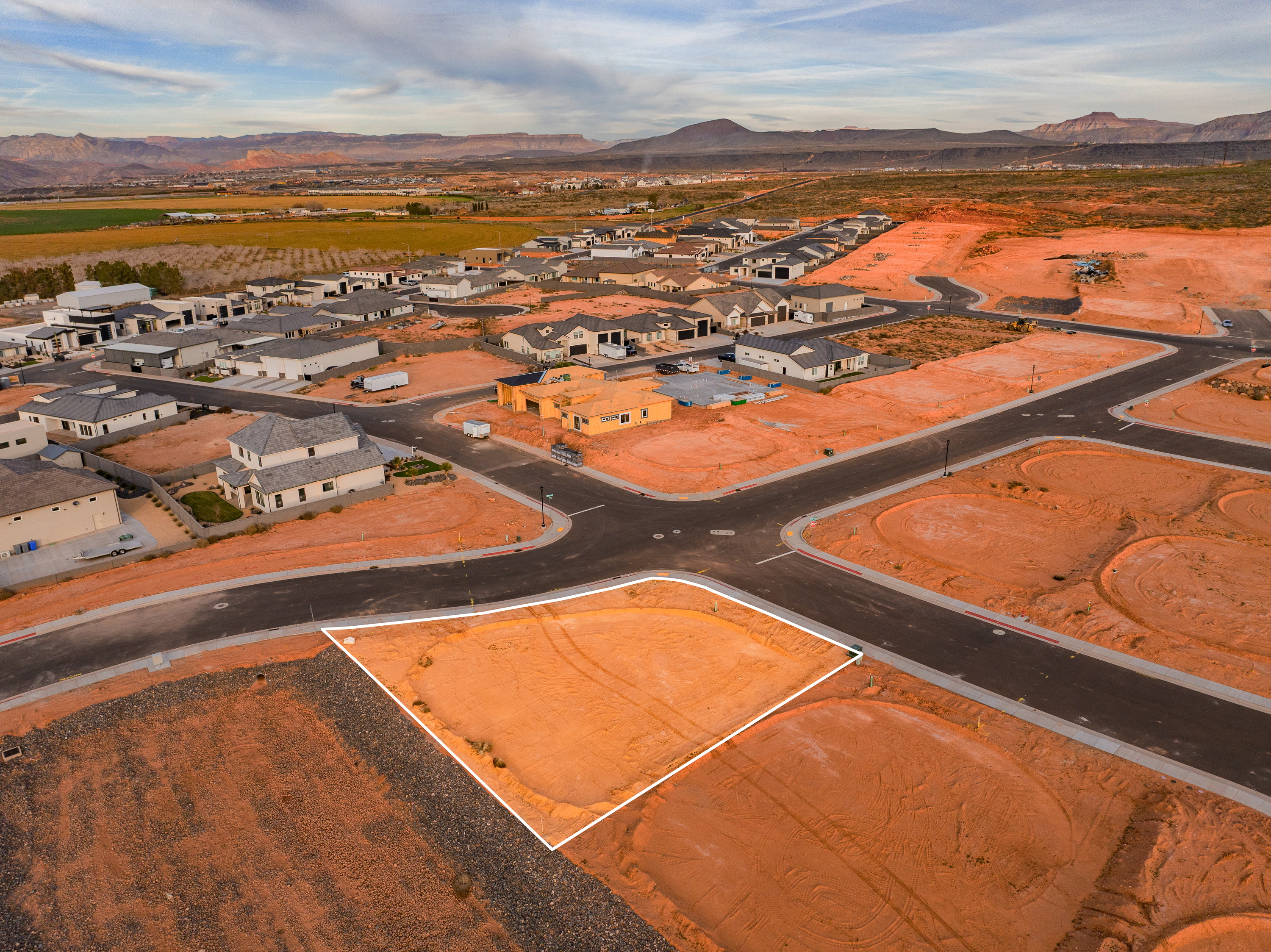 Aerial view of residential area with a mountainous background