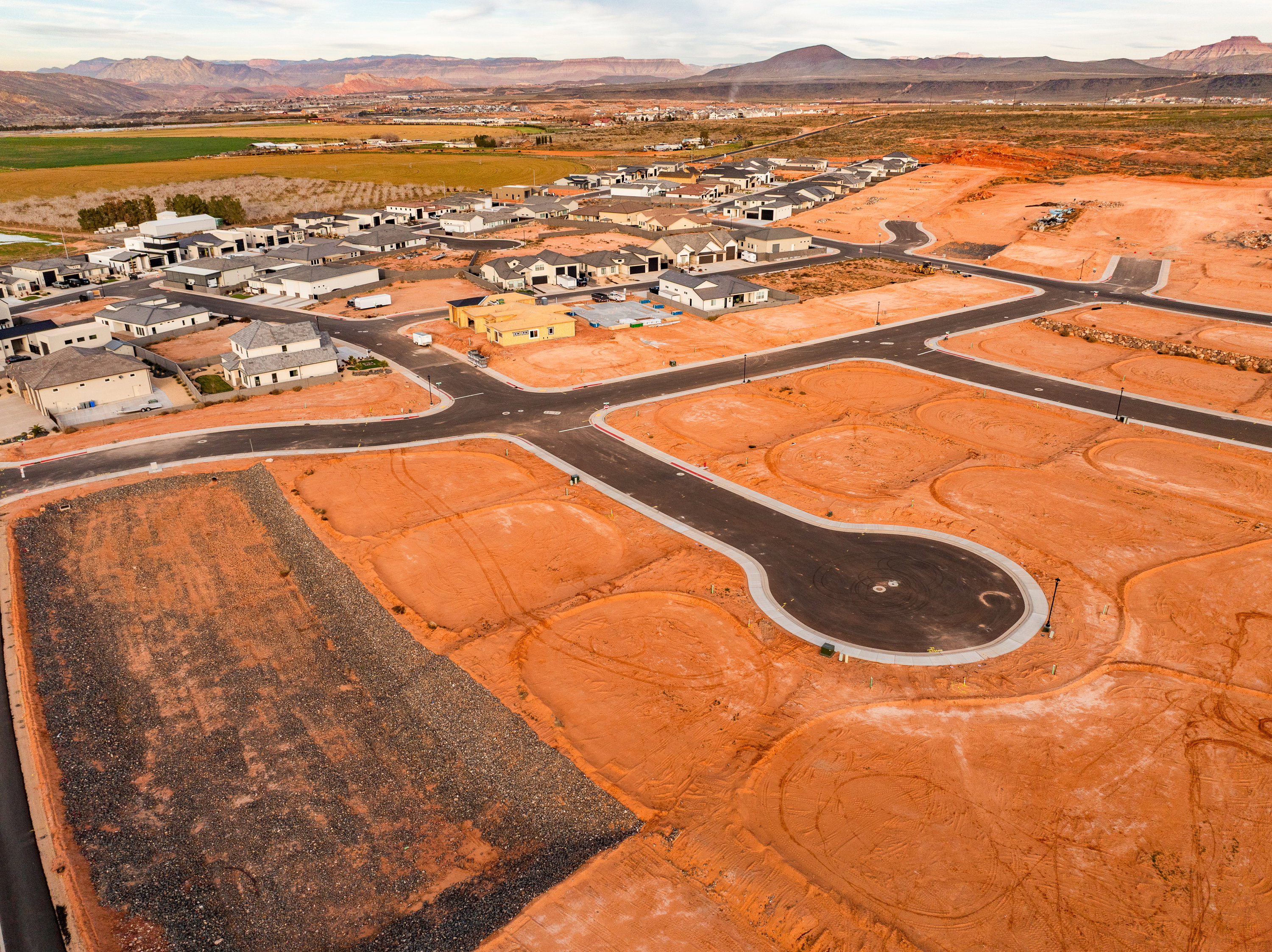 Aerial view of residential area featuring a mountain backdrop