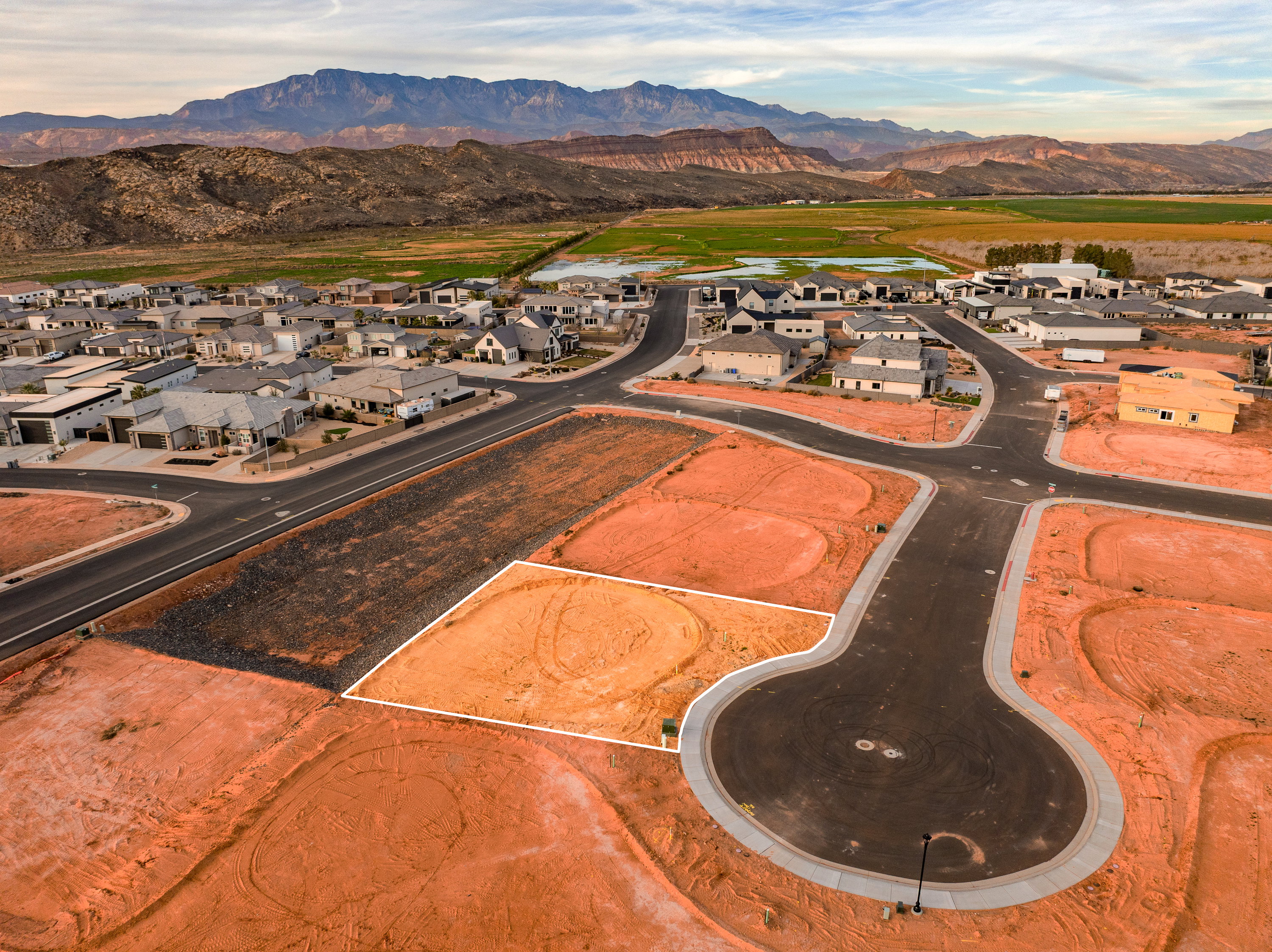 Aerial view of residential area with a mountain backdrop