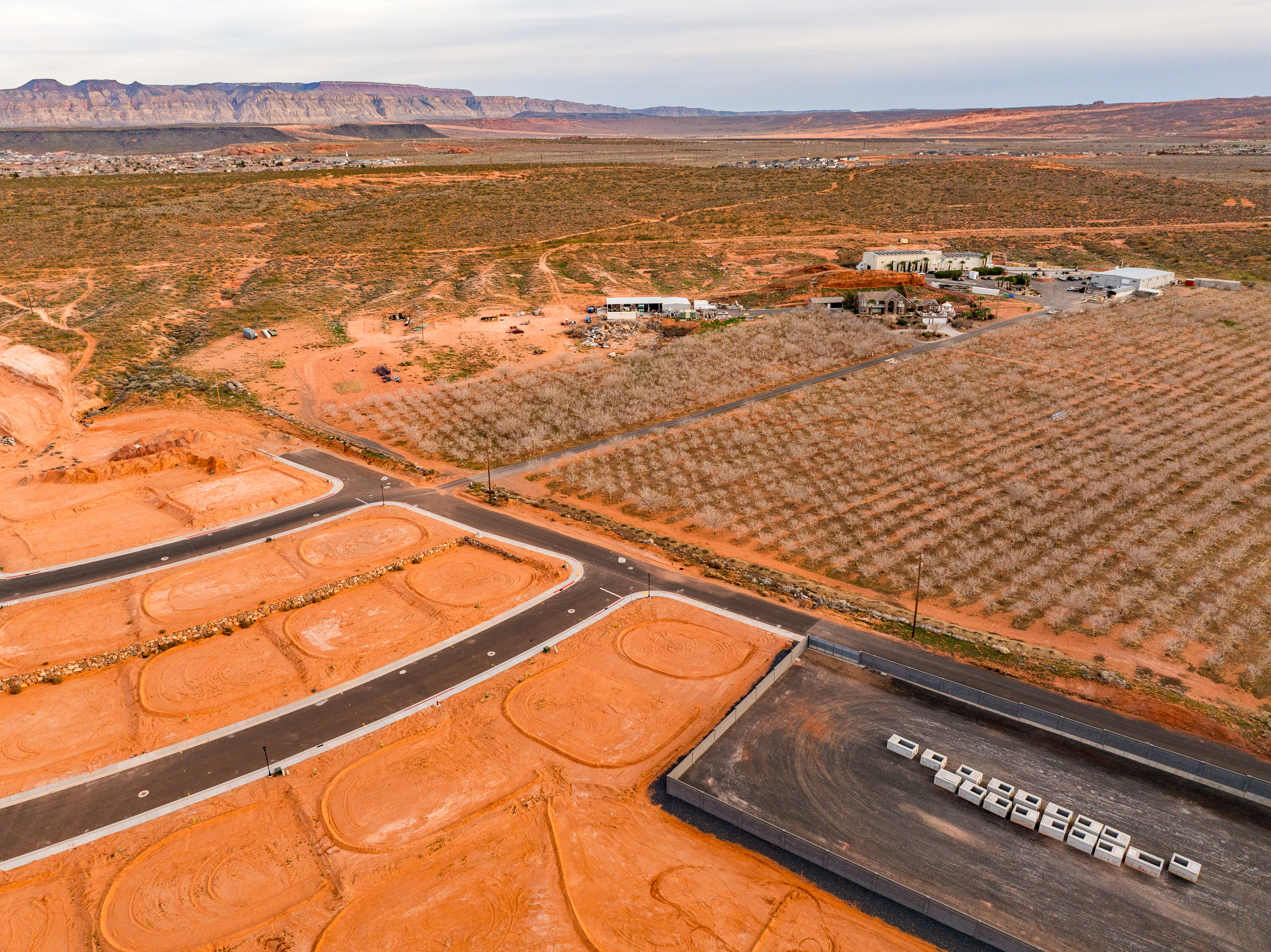 Overview of rural landscape with a desert landscape and a mountainous background