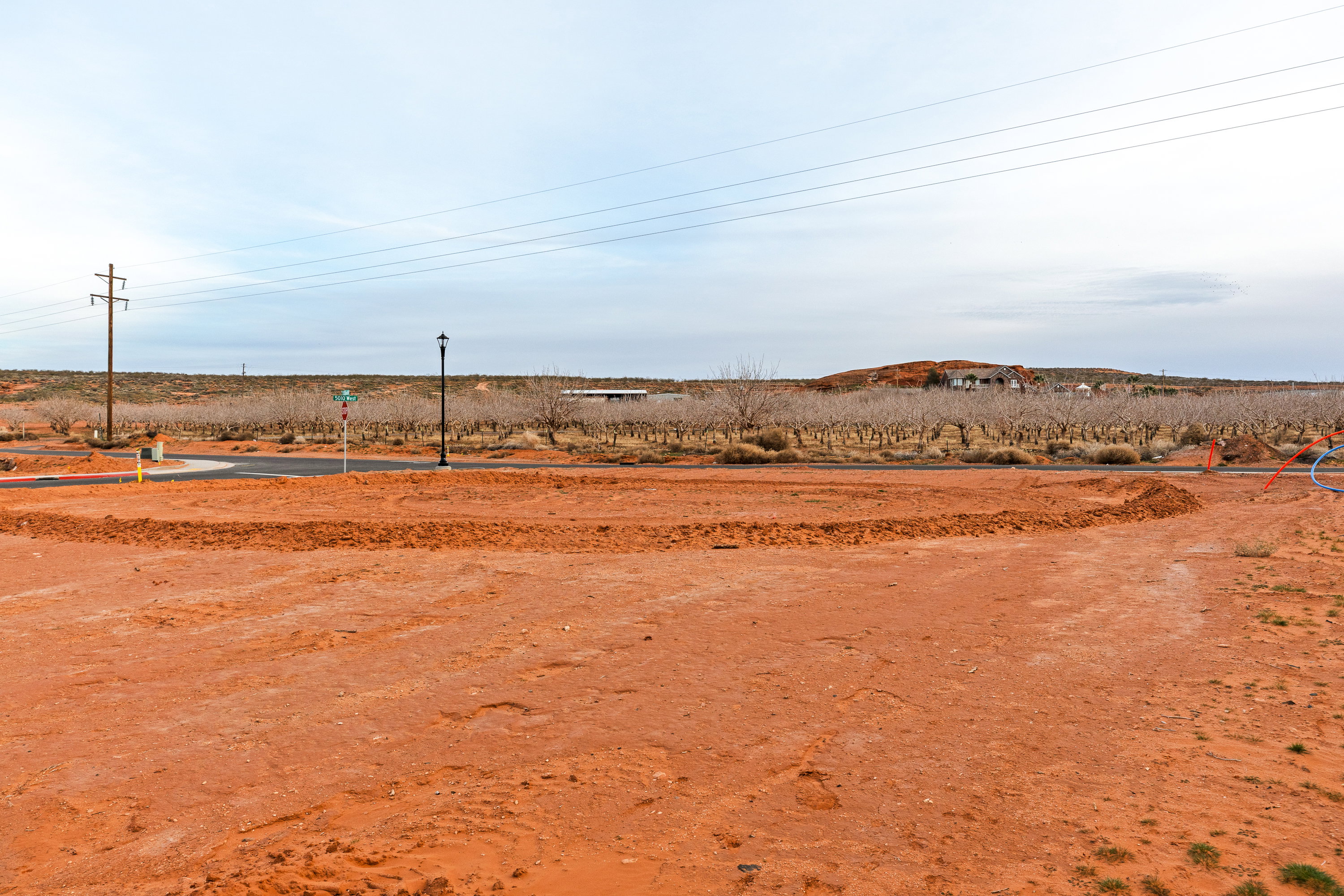 View of yard with a rural view