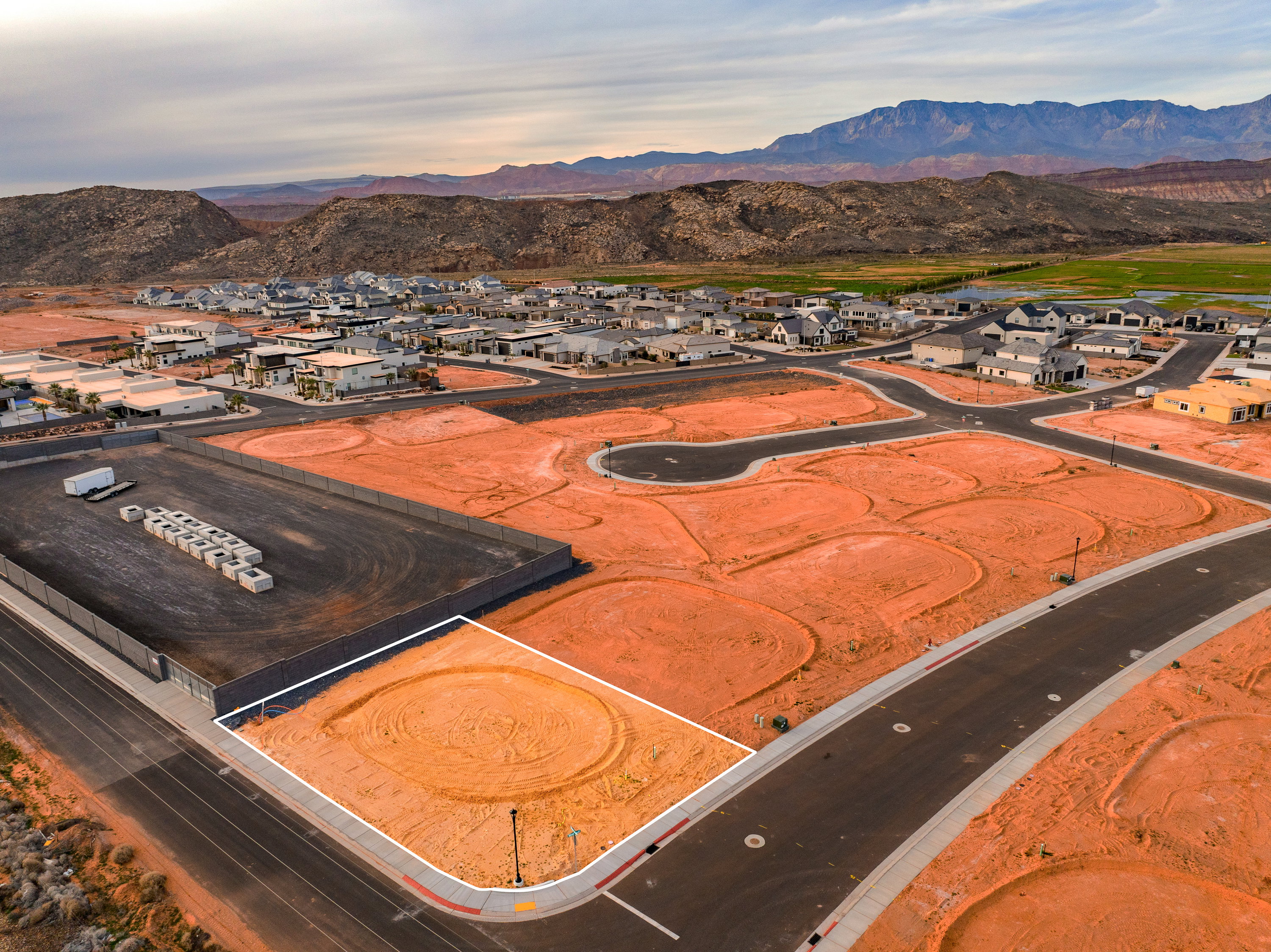 Aerial view of residential area featuring a mountainous background