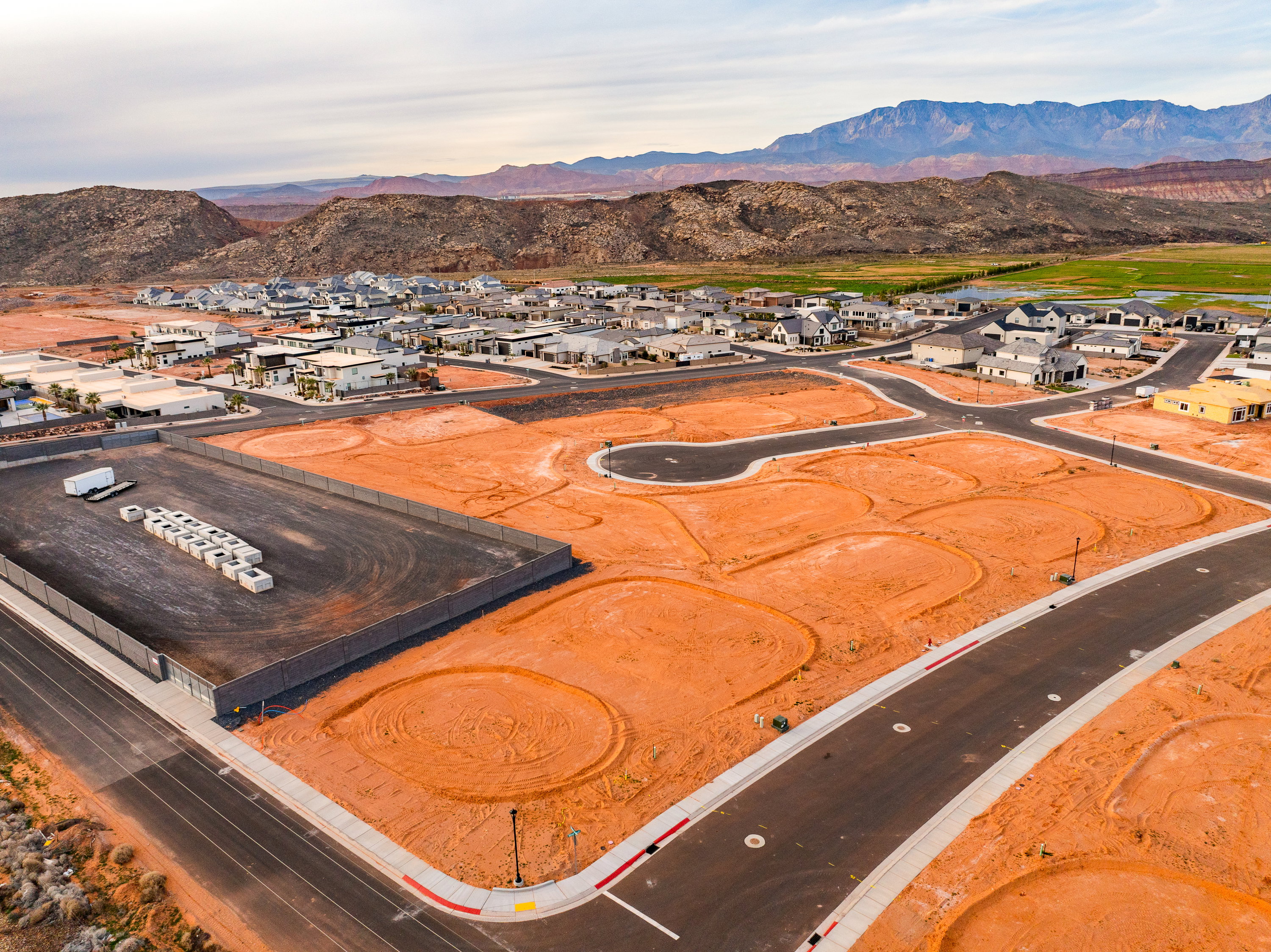 Aerial view of residential area featuring a mountain backdrop