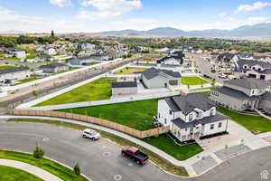 Aerial view of residential area with a mountainous background