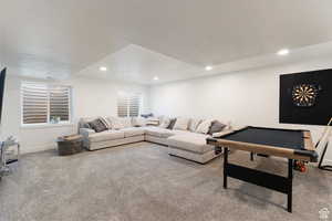 Living area with carpet flooring, billiards, and recessed lighting