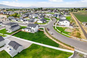 Aerial perspective of suburban area featuring mountains