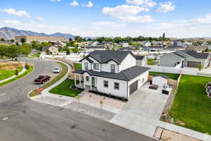 Aerial view of residential area featuring mountains