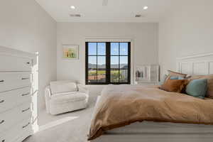 Bedroom with a mountain view, carpet, recessed lighting, and ceiling fan