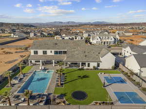 Aerial perspective of suburban area featuring mountains