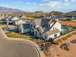Aerial perspective of suburban area with a mountainous background