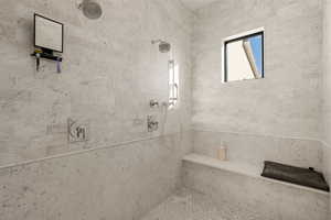 Full bath with tiled shower