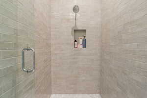 Bathroom with tiled shower