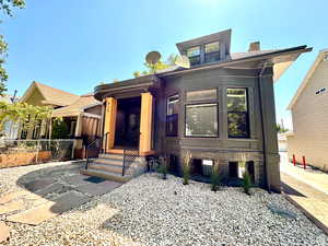 View of front of property with a chimney