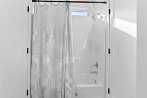 Bathroom featuring shower / bath combo