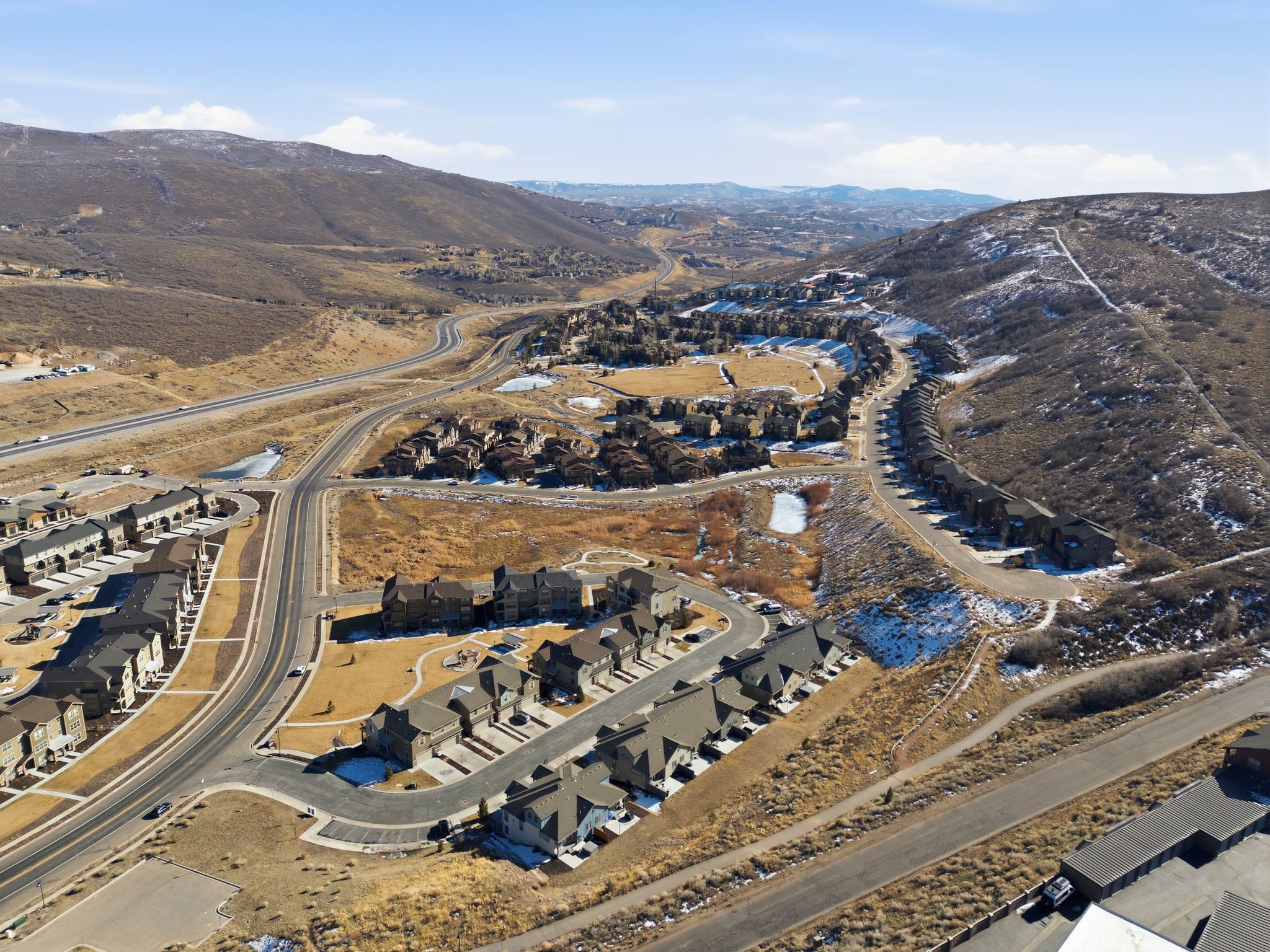 Drone / aerial view of a mountain backdrop