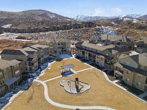 Aerial view of residential area with a mountainous background