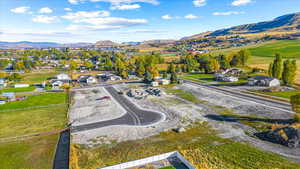 Aerial view of residential area featuring mountains