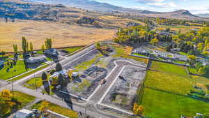 Aerial perspective of suburban area featuring mountains