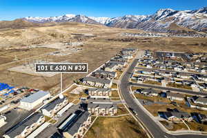 Aerial perspective of suburban area featuring mountains