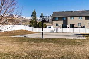 View of sport court with community basketball court and a mountain view