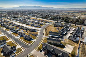 View of property location with nearby suburban area and a mountain backdrop