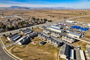 Aerial view of residential area featuring mountains