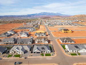 Aerial view of residential area with a mountain backdrop