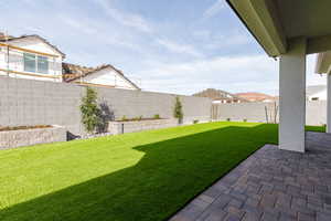 Fenced backyard featuring a patio area