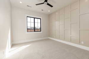 Unfurnished room with light colored carpet, recessed lighting, and ceiling fan