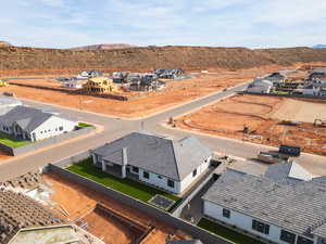 Aerial perspective of suburban area with a mountain backdrop