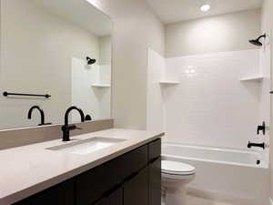 Full bathroom with vanity and shower / bath combination