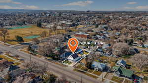 Southwest-facing aerial overview of the property’s location within the surrounding neighborhood.