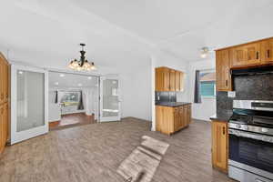 Dining area connecting living and kitchen spaces.