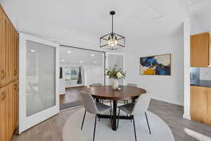 Virtually staged dining space with room to gather and share meals.