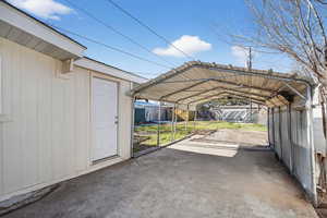 Covered parking area.