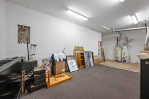 Misc room featuring secured water heater