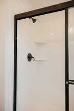 Bathroom view of a stall shower