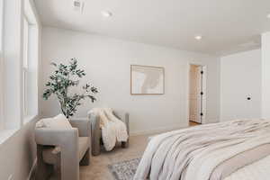Bedroom featuring carpet and recessed lighting