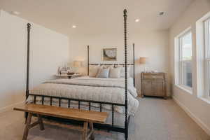 Bedroom featuring light colored carpet and recessed lighting