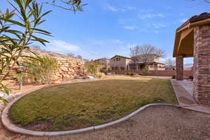 View of yard with a patio
