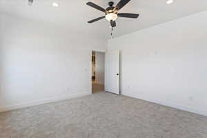 Unfurnished bedroom with carpet, recessed lighting, and a ceiling fan