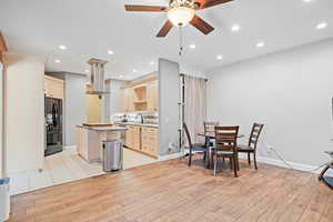 Dining area with recessed lighting, ceiling fan, and light wood-style flooring