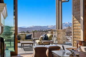 Balcony with outdoor lounge area and a mountain view