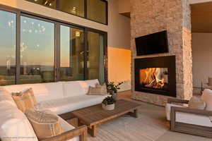 Tiled living area featuring a fireplace
