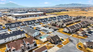 Aerial view of property's location featuring mountains