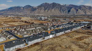 Aerial view of residential area featuring a mountainous background