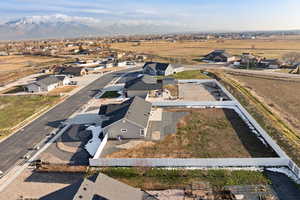 View of property location featuring nearby suburban area and a mountain background